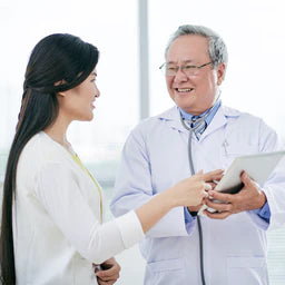 Health care provider consulting with patient
